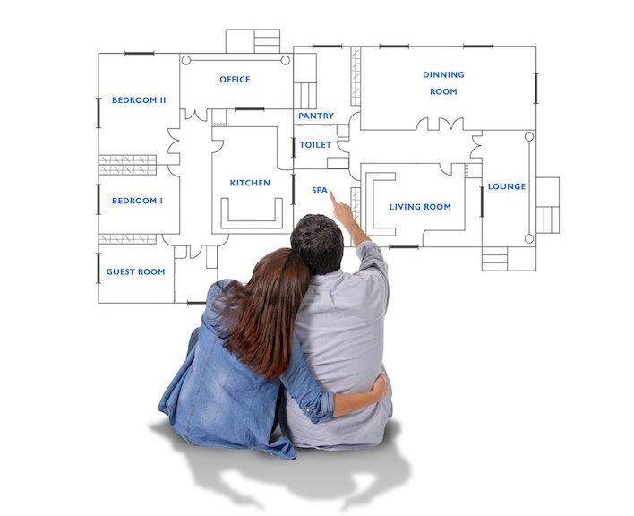 Young couple dreaming of new house in real state concept